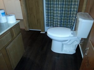 New floor--and new toilet (which, in the South, is a "commode")