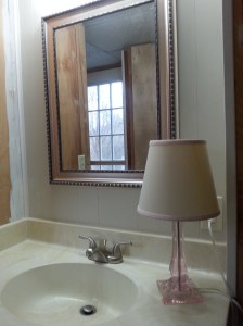 Painting the paneling, changing the color scheme, new mirror....Someday I'll finish all the painting!